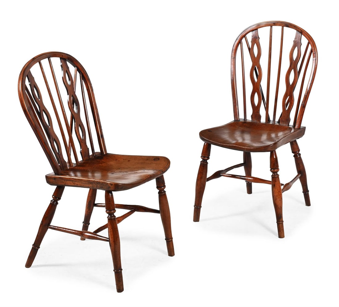 A PAIR OF YEW AND ELM WINDSOR CHAIRS, IN THE MANNER OF ROBERT PRIOR, EARLY 19TH CENTURY (1 of 3)