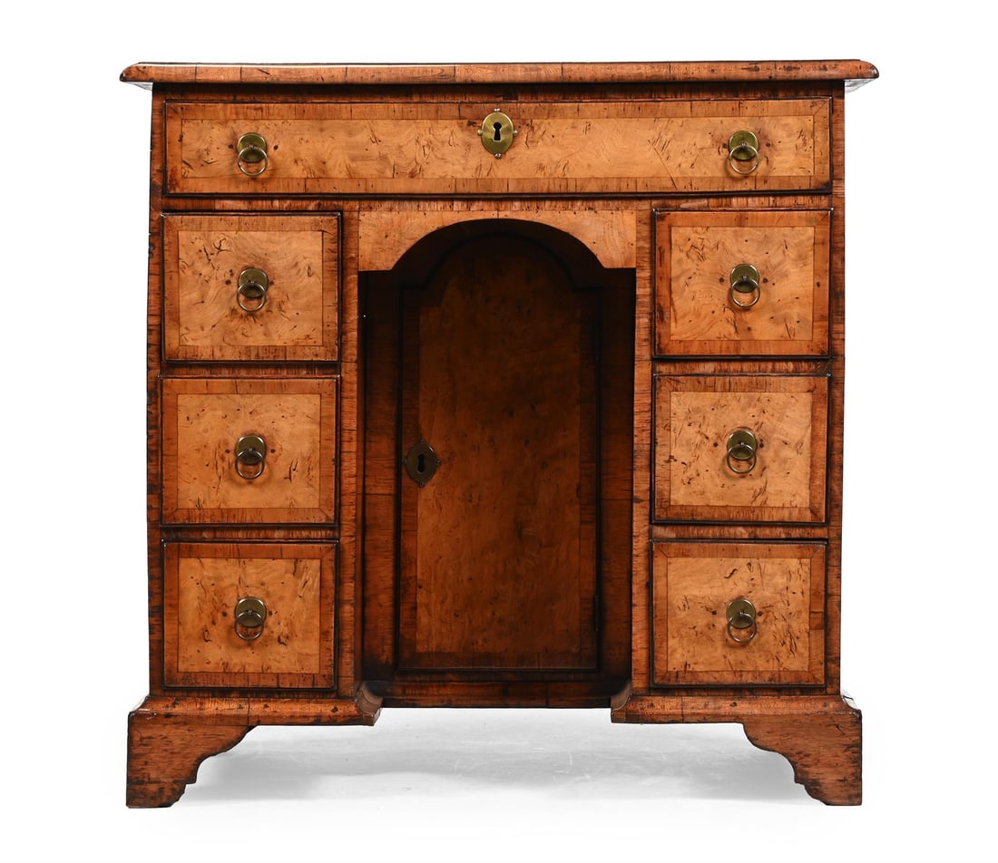 A GEORGE II ELM, BURR ELM AND WALNUT KNEEHOLE DESK, CIRCA 1735 (1 of 3)