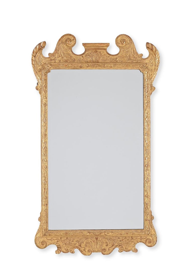 A GEORGE II CARVED GILTWOOD AND GESSO MIRROR, CIRCA 1740: A GEORGE II CARVED GILTWOOD AND GESSO MIRROR CIRCA 1740105cm high, 62cm wide