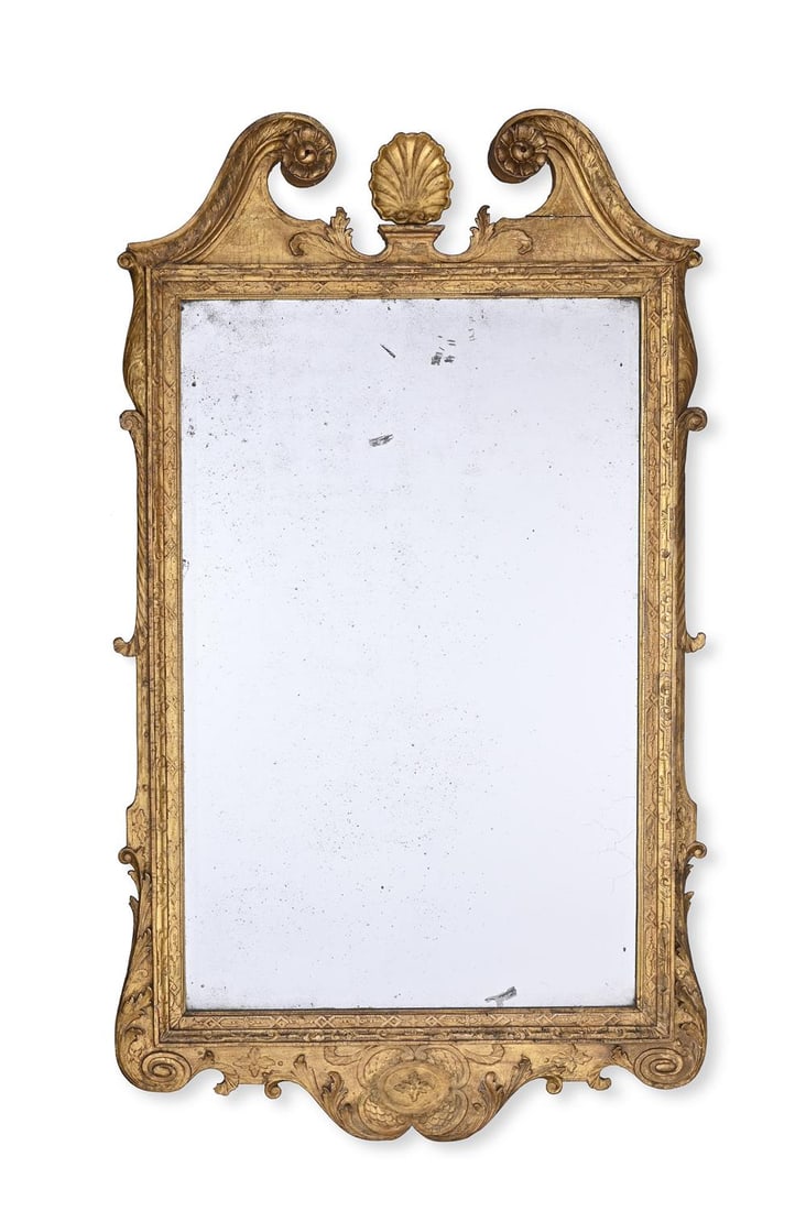 A LARGE GEORGE II CARVED GILTWOOD MIRROR, CIRCA 1750: A LARGE GEORGE II CARVED GILTWOOD MIRRORCIRCA 1750128cm high, 70.5cm deep