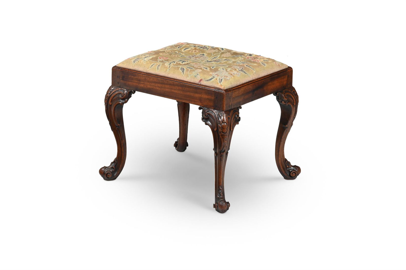 A GEORGE III MAHOGANY AND NEEDLEWORK UPHOLSTERED STOOL, IN THE MANNER OF THOMAS CHIPPENDALE (1 of 3)