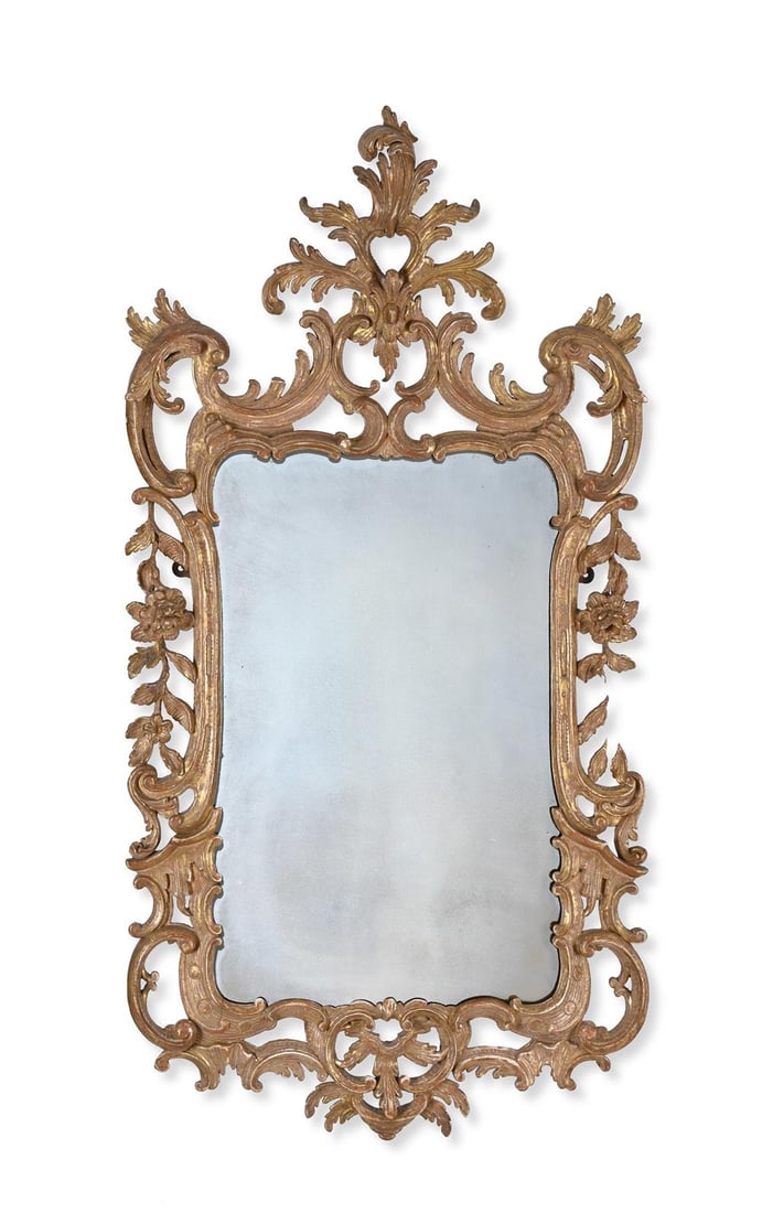 A GEORGE III CARVED GILTWOOD MIRROR, CIRCA 1760 (1 of 2)