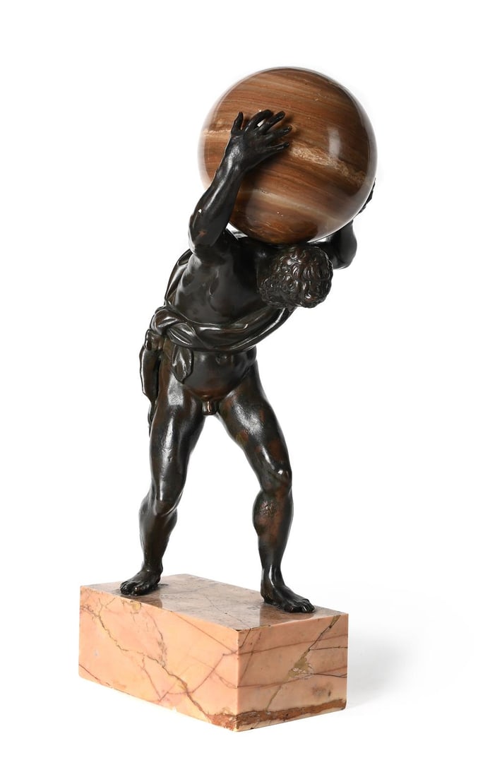 A BRONZE FIGURE OF ATLAS HOLDING A MARBLE SPHERE, 19TH CENTURY: A BRONZE FIGURE OF ATLAS HOLDING A MARBLE SPHERE 19TH CENTURY Later sphere, set on a marble base 47cm high, the base 11 x 20cm