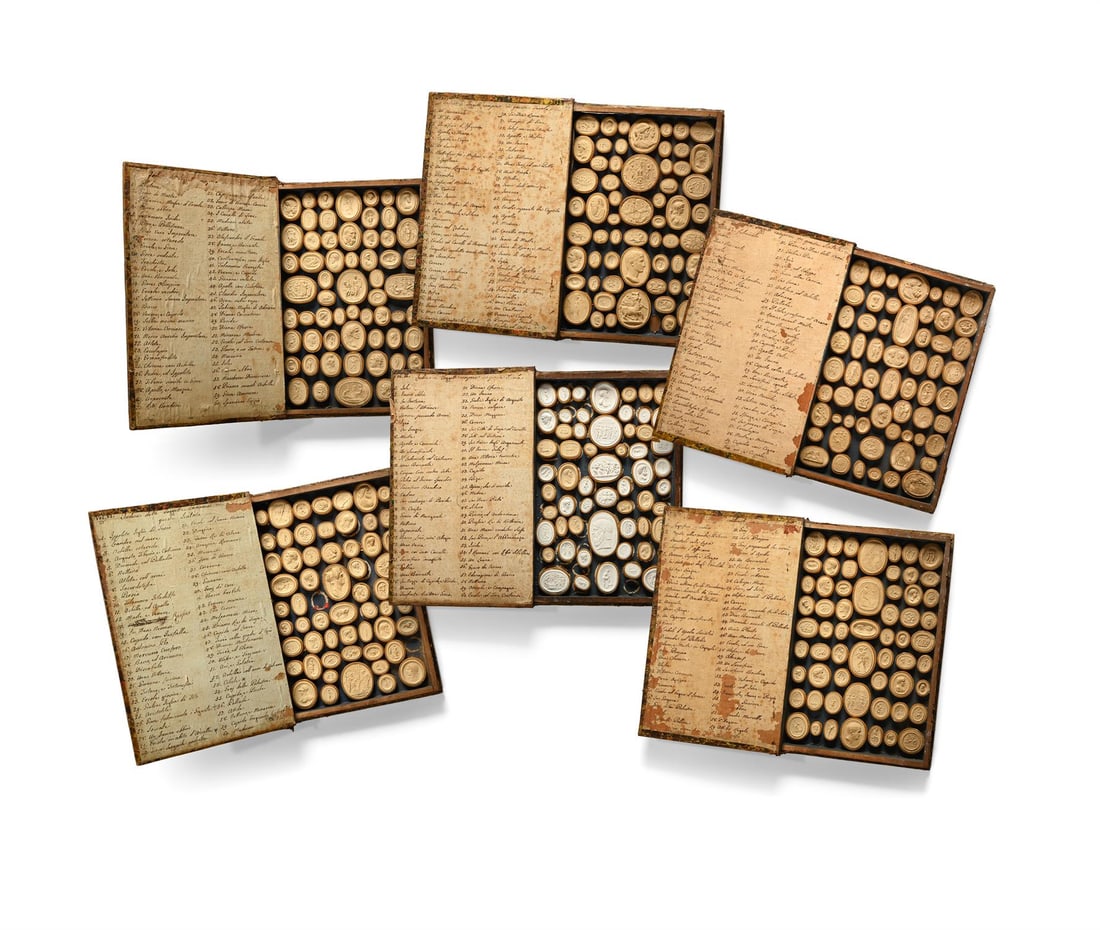 A GRAND TOUR SET OF SIX MARBLED BOOKS CONTAINING INTAGLIOS OR CAMEOS, IN THE MANNER OF DOLCE (1 of 11)