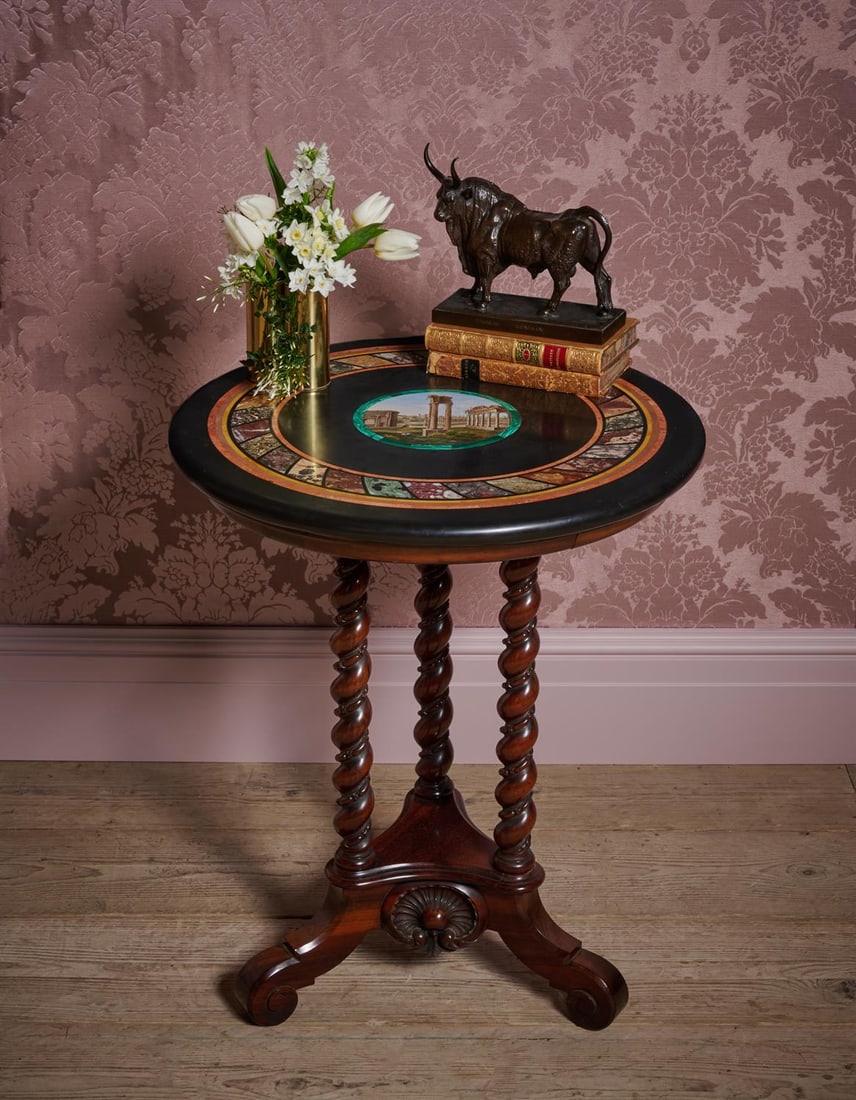 Y AN ITALIAN MICRO MOSAIC AND SPECIMEN MARBLE OCCASIONAL TABLE, 19TH CENTURY: Y AN ITALIAN MICRO MOSAIC AND SPECIMEN MARBLE OCCASIONAL TABLE19TH CENTURYThe slate top centred with a micro mosaic view of the Roman Forum, on a carved Goncalo Alves base61cm high, the top 74.5cm dia