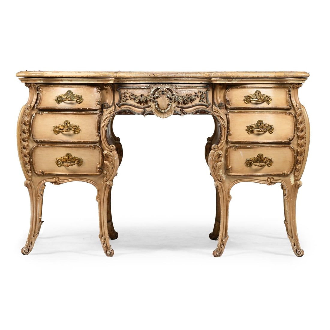 A CARVED, CREAM PAINTED AND PARCEL GILT SERPENTINE DESK, MADE OR RETAILED BY JETLEY OF MAYFAIR (1 of 3)
