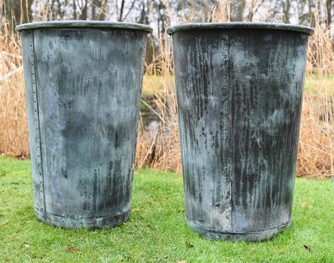 A LARGE PAIR OF PATINATED COPPER AND RIVETED CIRCULAR PLANTERS (1 of 1)