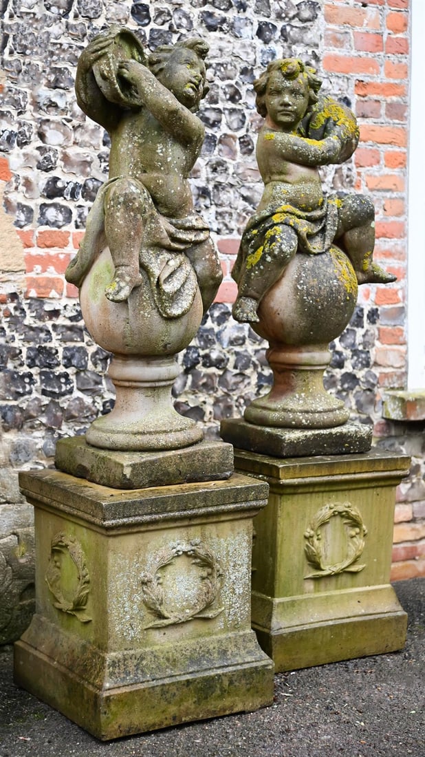 A PAIR OF COMPOSITION STONE FIGURES OF INFANT MUSCIANS, LATE 20TH CENTURY (1 of 1)