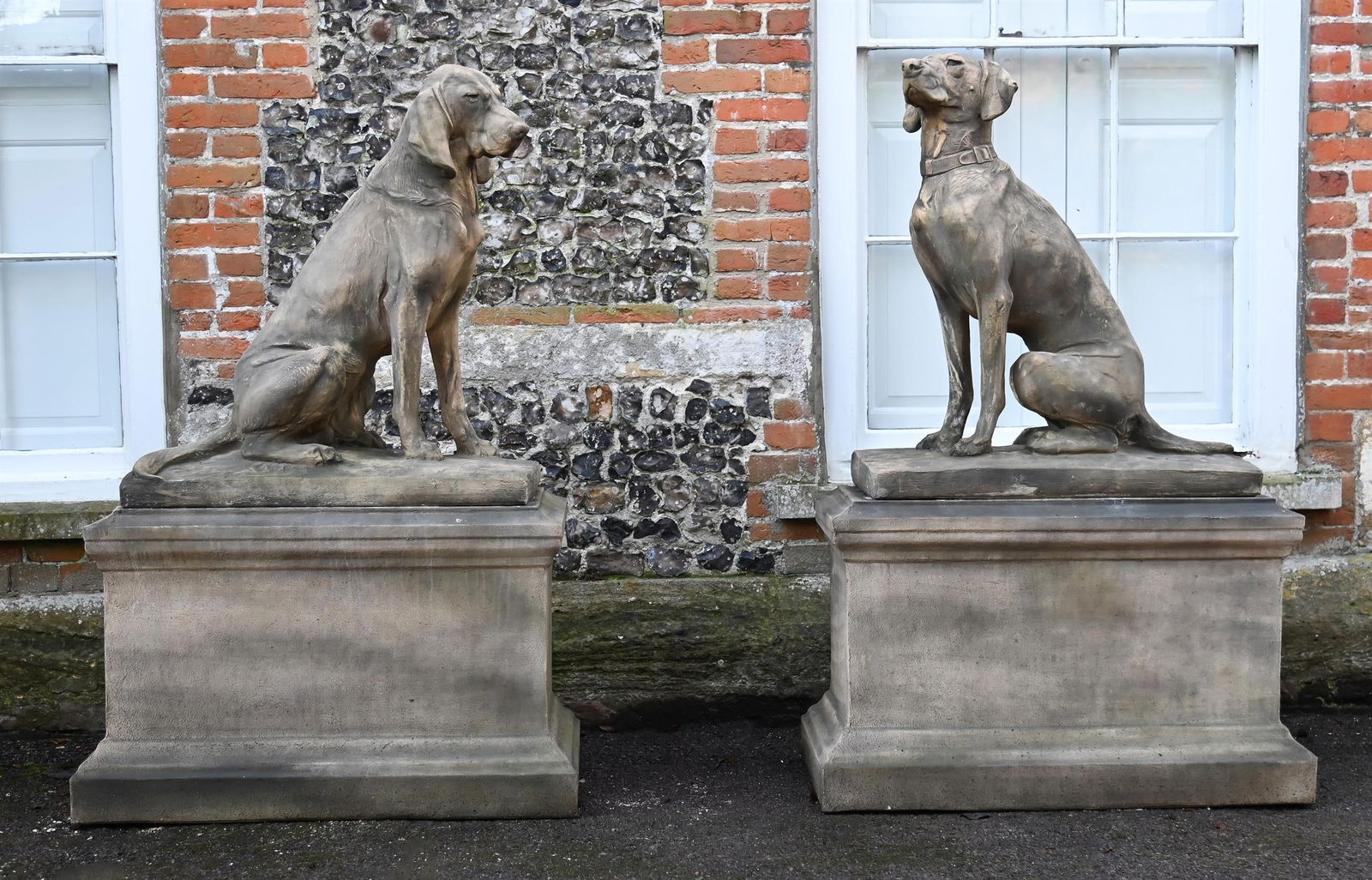 A LARGE PAIR OF COMPOSITION STONE SEATED DOGS ON PEDESTALS, CONTEMPORARY (1 of 3)