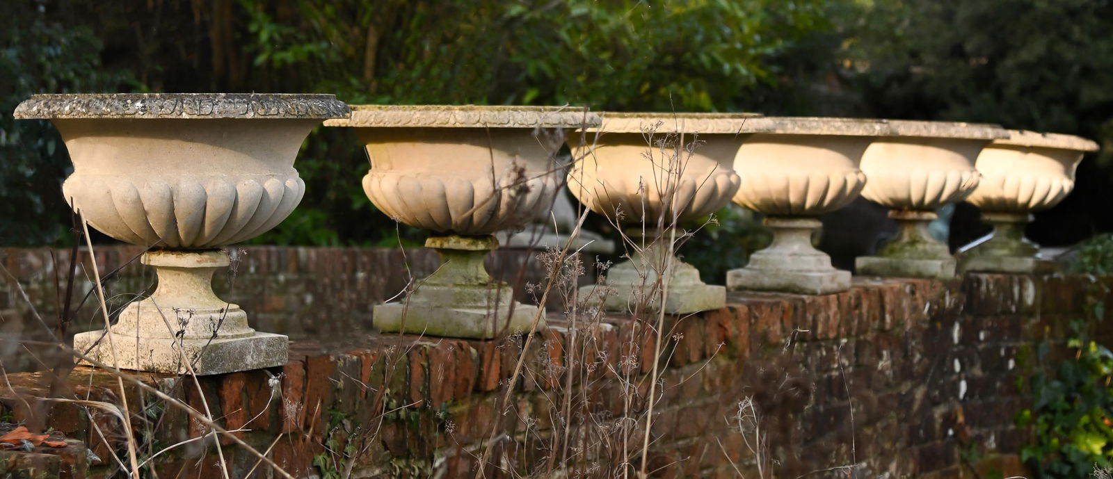 A SET OF SIX COMPOSITION STONE PEDESTAL PLANTERS, 20TH CENTURY (1 of 1)