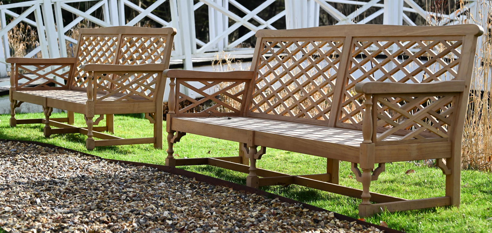 A PAIR OF TEAK 'CHIPPENDALE TRELLIS BACK' GARDEN BENCHES, CONTEMPORARY (1 of 1)