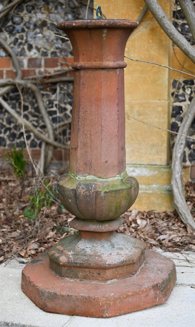 A TERRACOTTA 'PRIORY PEDESTAL' SUNDIAL, BY COMPTON POTTERY, EARLY 20TH CENTURY: A TERRACOTTA 'PRIORY PEDESTAL' SUNDIAL BY COMPTON POTTERY, EARLY 20TH CENTURY With bronze plate Silens London, unmarked 100cm high, the base 50cm wide