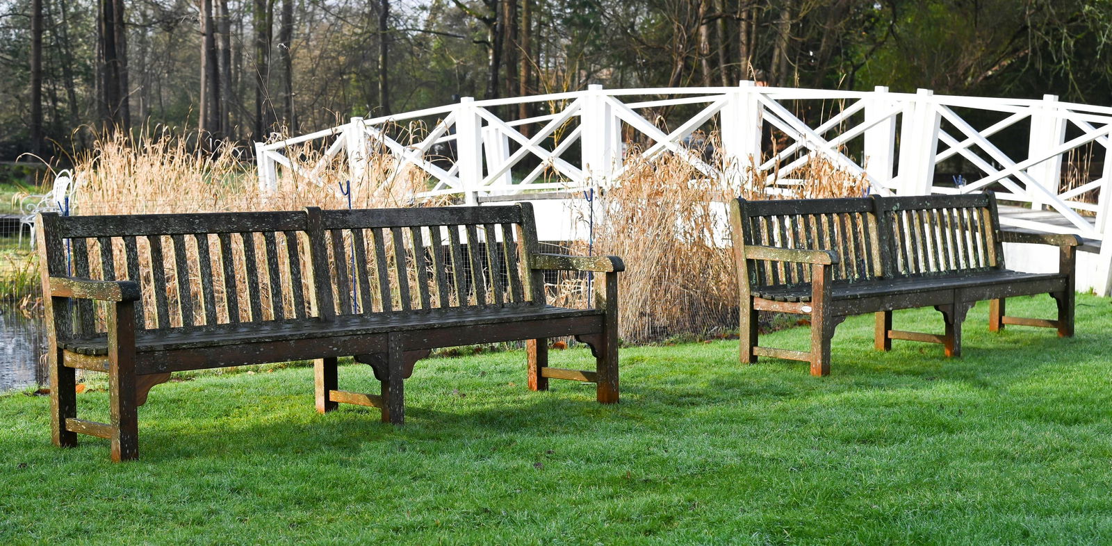 A LARGE PAIR OF SLAT BACK TEAK GARDEN BENCHES, CONTEMPORARY (1 of 1)