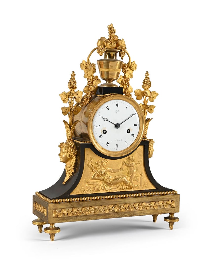 A LOUIS XVI ORMOLU AND OXIDISED BRASS MANTEL CLOCK (1 of 3)