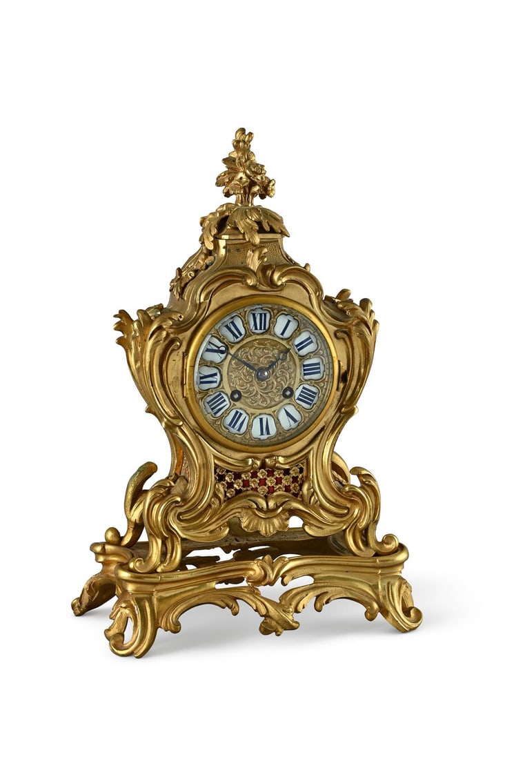 A FRENCH LOUIS XV STYLE ORMOLU MANTEL CLOCK IN THER MANNER OF JOSEPH DE SAINT GERMAIN (1 of 2)