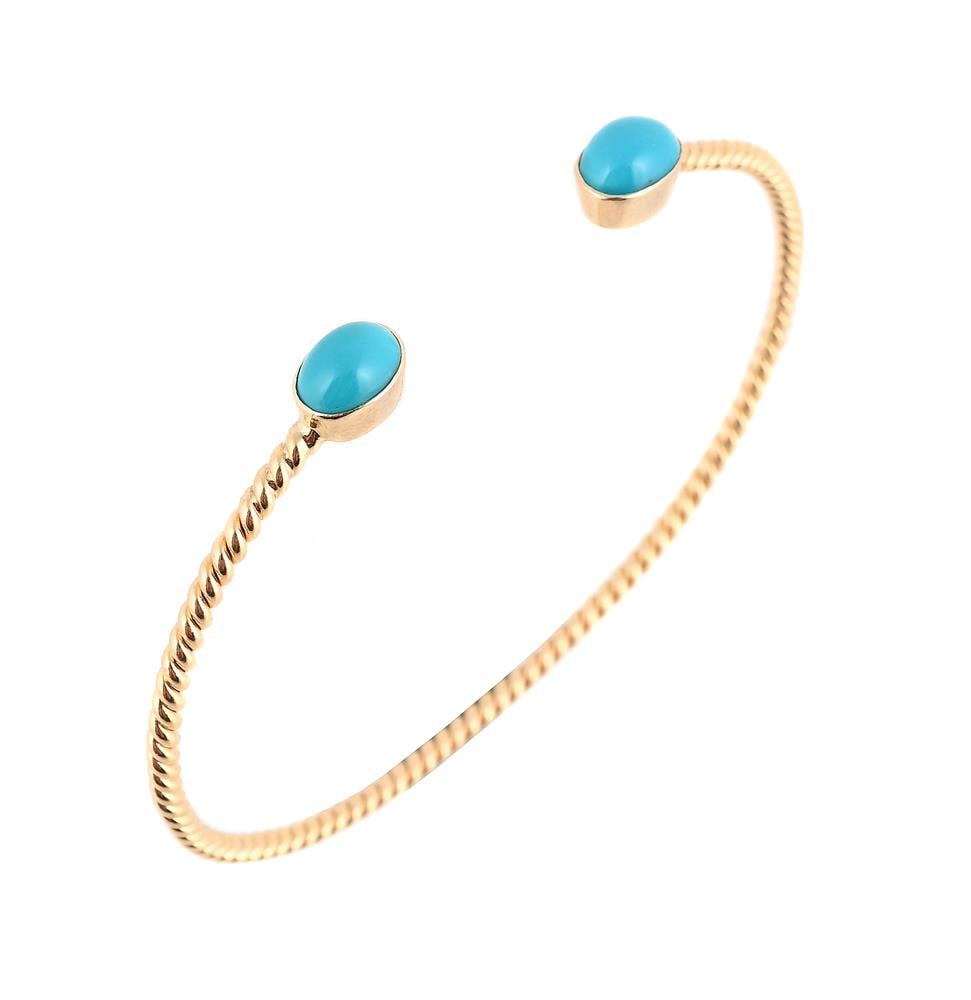 A RECONSTITUTED TURQUOISE SET BANGLE (1 of 2)