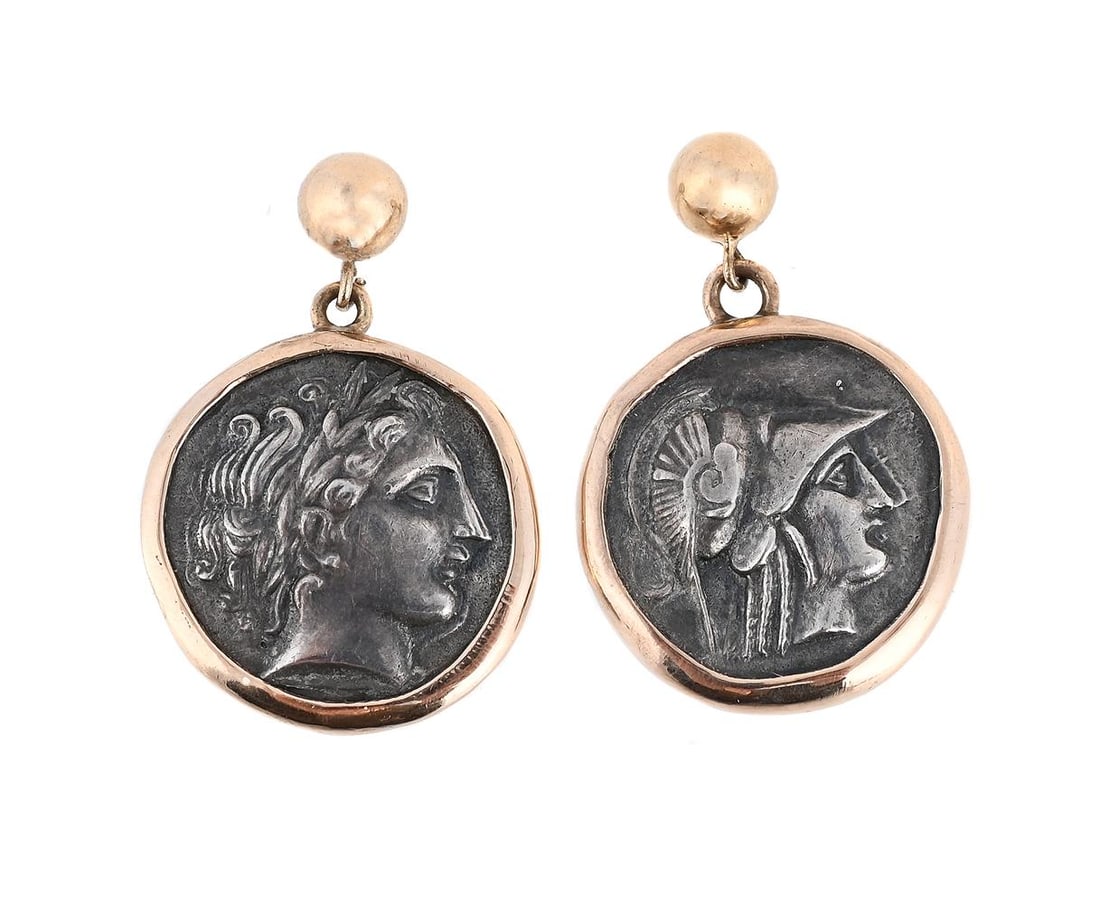 A PAIR OF COIN EARRINGS: A PAIR OF COIN EARRINGS The earrings w