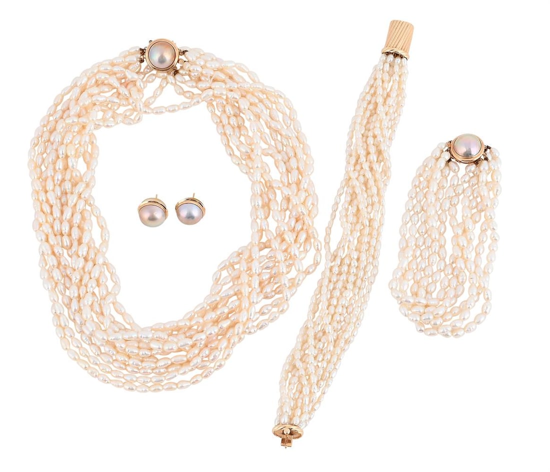 A FRESHWATER CULTURED PEARL AND MABÉ PEARL SUITE: A FRESHWATER CULTURED PEARL AND MABÉ PEARL SUITE The necklace with six rows of freshwater cultured pearls to a mabé pearl set clasp, stamped 14k 585, together with a matching