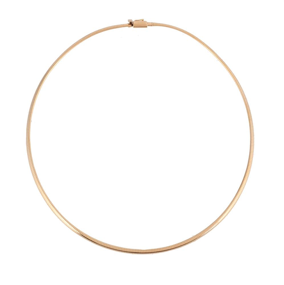 A COLLAR NECKLACE: A COLLAR NECKLACE The polished necklace to a box clasp, stamped 750 Size/dimensions: 39cm long 