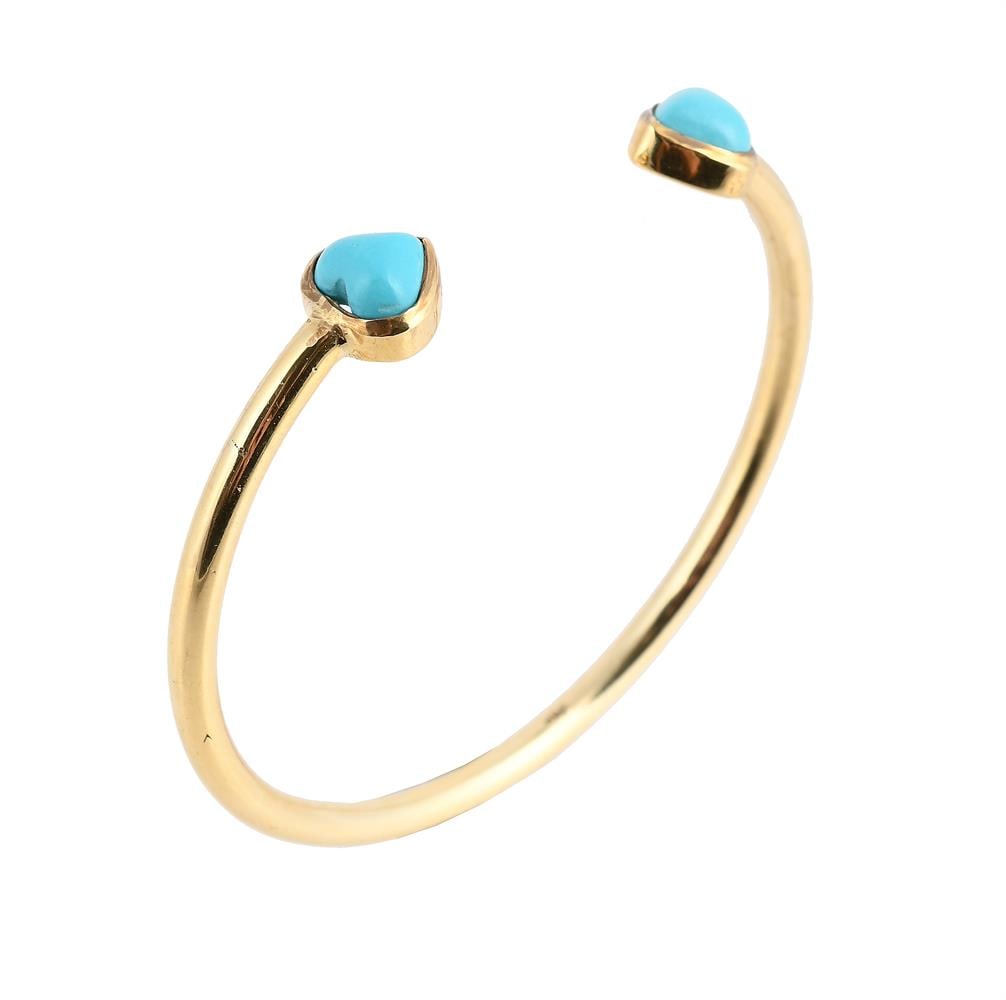 A RECONSTITUTED TURQUOISE BANGLE: A RECONSTITUTED TURQUOISE BANGLE The h