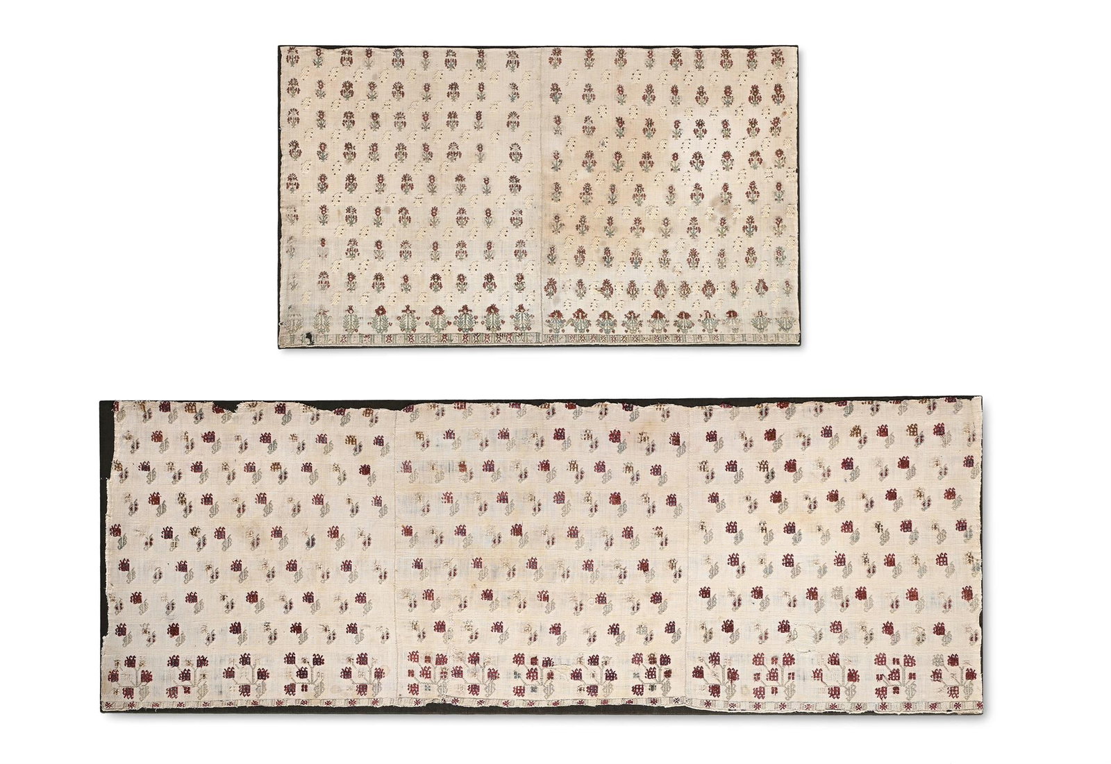 TWO FRAMED PANELS OF DODECANESE FABRIC FRAGMENTS, 18TH CENTURY: DODECANESETWO MOUNTED PANELS OF FABRIC FRAGMENTS, 18TH CENTURY141.5cm x 50cm and 93.5cm x 54cmThe Dodecanese, in the Aegean Sea, is a group of Greek islands known for their medieval castles, Byzantine