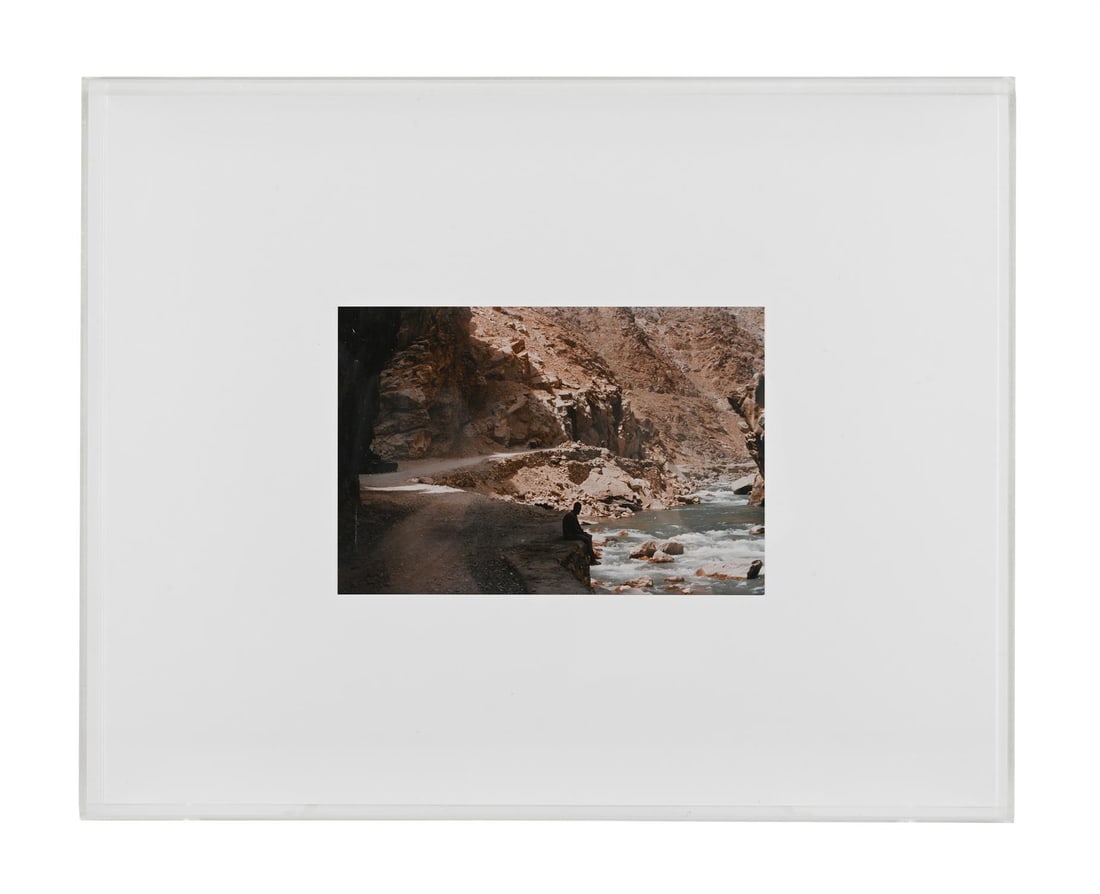 λ MARINE HUGONNIER (FRENCH, B.1969), 'UNTITLED': λ MARINE HUGONNIER (FRENCH, B.1969)'UNTITLED'Photograph mounted on thin card, framed in small Perspex box 38cm x 31cm x 5cm Marine Hugonnier's work researches the politics of vision. Across film,