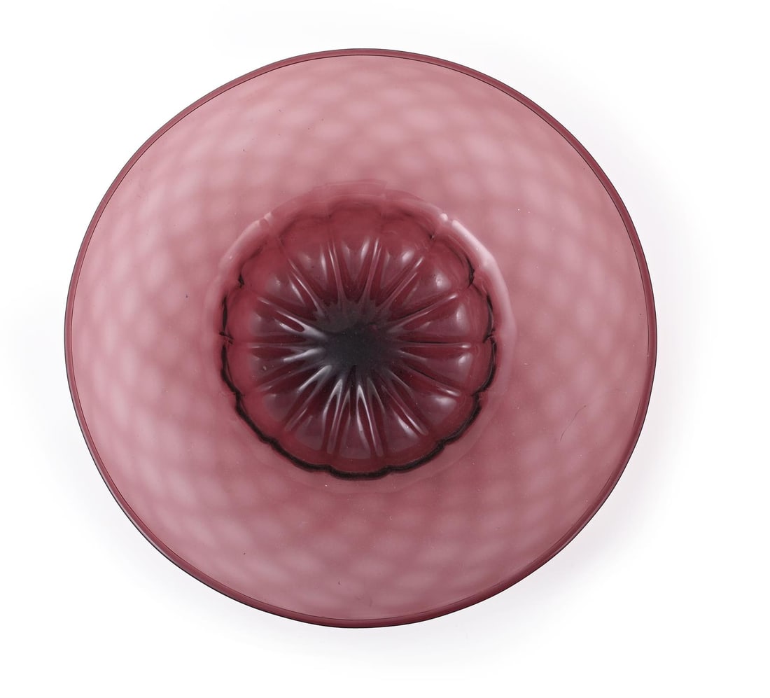 VITTORIO ZECCHIN (ITALIAN, 1878-1947), A WIDE CHARGER/VESSEL, CIRCA 1925: VITTORIO ZECCHIN (ITALIAN, 1878-1947)A WIDE CHARGER/VESSEL, CIRCA 1925Purple glass, with 'meza stampaura' deep well, and slightly iridised surfaceAcid stamped 'MVM Cappellin Murano'38.5cm diameterLite