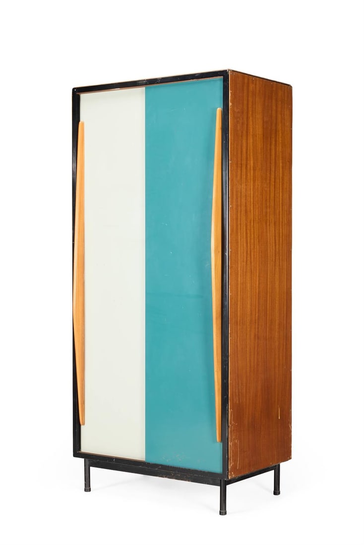 WILLY VAN DE MEEREN (BELGIAN, 1923-2002), TWO WARDROBES, CIRCA 1950: WILLY VAN DE MEEREN (BELGIAN, 1923-2002)TWO WARDROBES, CIRCA 1950Two tone lacquered metal and stained wood, the sliding doors revealing a metal lined interior with adjustable shelves, raised on metal