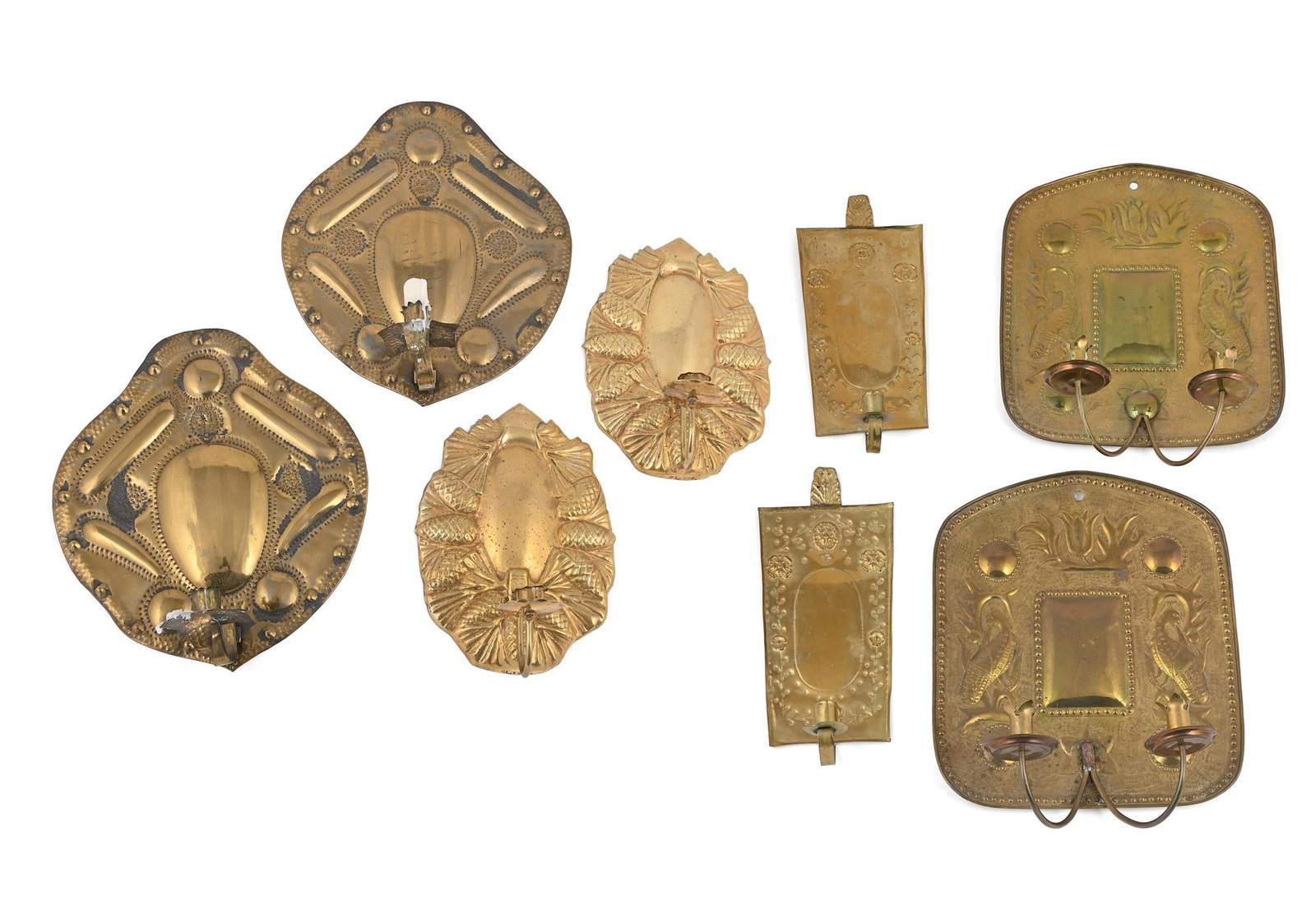 FOUR PAIRS OF BRASS WALL SCONCES IN THE ARTS & CRAFTS STYLE, 20TH CENTURY: ARTS & CRAFTS STYLEFOUR PAIRS OF BRASS WALL SCONCES, 20TH CENTURYCast and embossed decoration, the larger pair with double sconces and stylised fantastic creatures, the three smaller sets with single