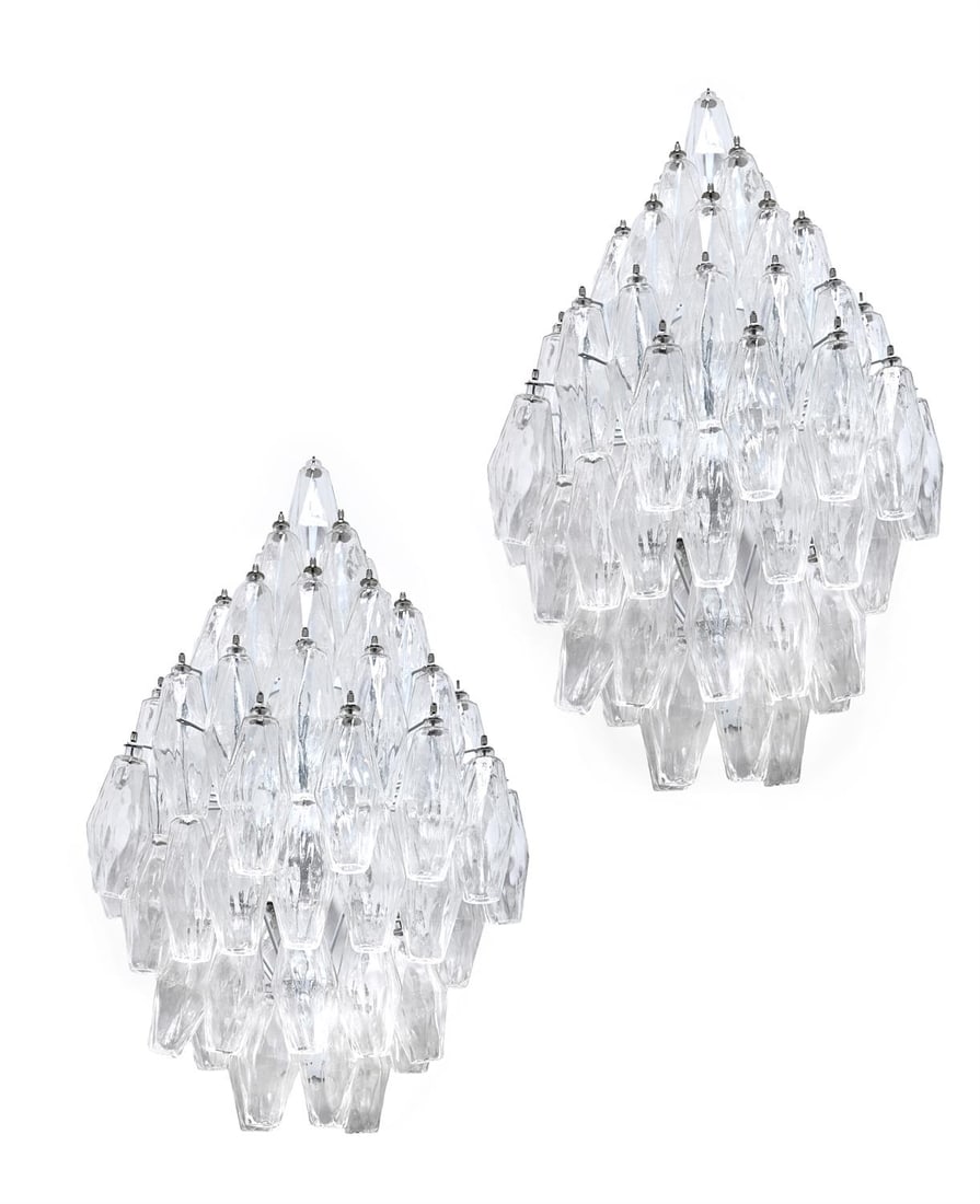 CARLO SCARPA (ITALIAN, 1906-1978), PAIR OF 'POLIEDRI' WALL LIGHTS; SECOND HALF 20TH CENTURY: CARLO SCARPA (ITALIAN, 1906-1978)PAIR OF 'POLIEDRI' WALL LIGHTS; SECOND HALF 20TH CENTURYHandblown polyhedron clear glass shades on white lacquer metal frame80cm hang (approx.)Literature: Franco Debon
