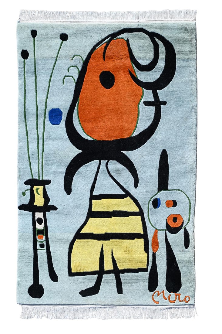 AFTER JOAN MIRÓ (SPANISH, 1893-1983), 'FEMME ET CHAT' RUG; SECOND HALF 20TH CENTURY: AFTER JOAN MIRÓ (SPANISH, 1893-1983) 'FEMME ET CHAT' RUG; SECOND HALF 20TH CENTURYWool, fringe short edges; stylised figure, cat and plant in yellow, orange, black and green Bearing woven signatu