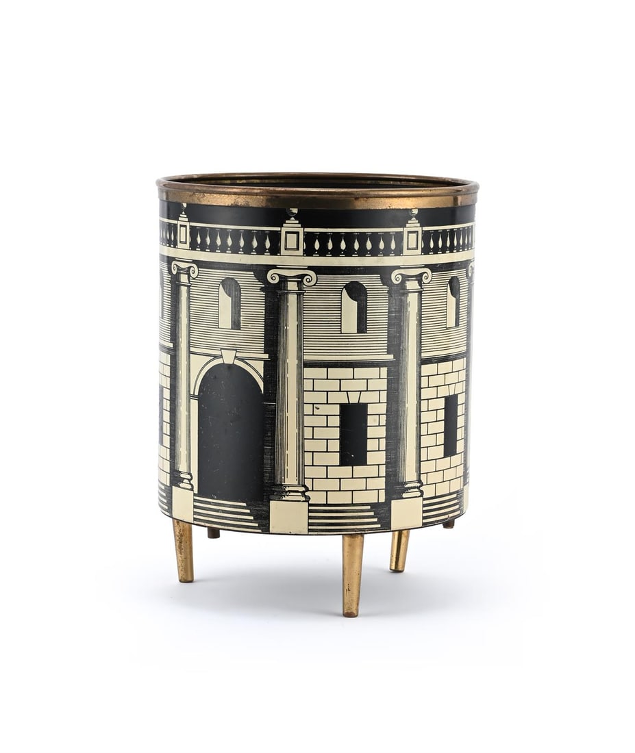 PIERO FORNASETTI (ITALIAN, 1913-1988), 'CASA CON COLONNE' WASTEPAPER BIN; CIRCA 1990: PIERO FORNASETTI (ITALIAN, 1913-1988)'CASA CON COLONNE' WASTEPAPER BIN; CIRCA 1990Hand-silkscreened and lacquered metal, brass rim and feetPrinted manufacture's mark to underside34cm high, 26.5cm diam