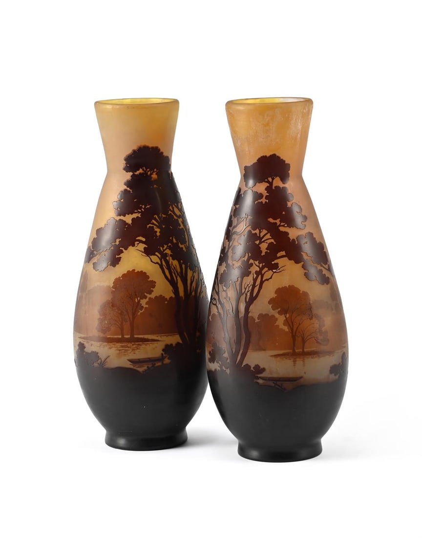 ÉMILE GALLÉ (FRENCH, 1846-1904), PAIR OF 'PAYSAGE' VASES; CIRCA 1900: ÉMILE GALLÉ (FRENCH, 1846-1904)PAIR OF 'PAYSAGE' VASES; CIRCA 1900Cameo glass; acid etched decoration of a river landscape against an opaque groundCameo signature 'Gallé' 40cm high
