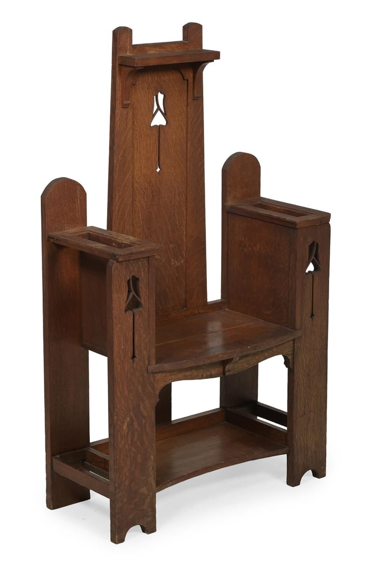 AN ARTS AND CRAFTS HALL SEAT AND STICK STAND; CIRCA 1900: ARTS AND CRAFTS A HALL SEAT AND STICK STAND; CIRCA 1900Oak; high back, pierced floral detail128.5cm high, 75.5cm wide, 33cm deep