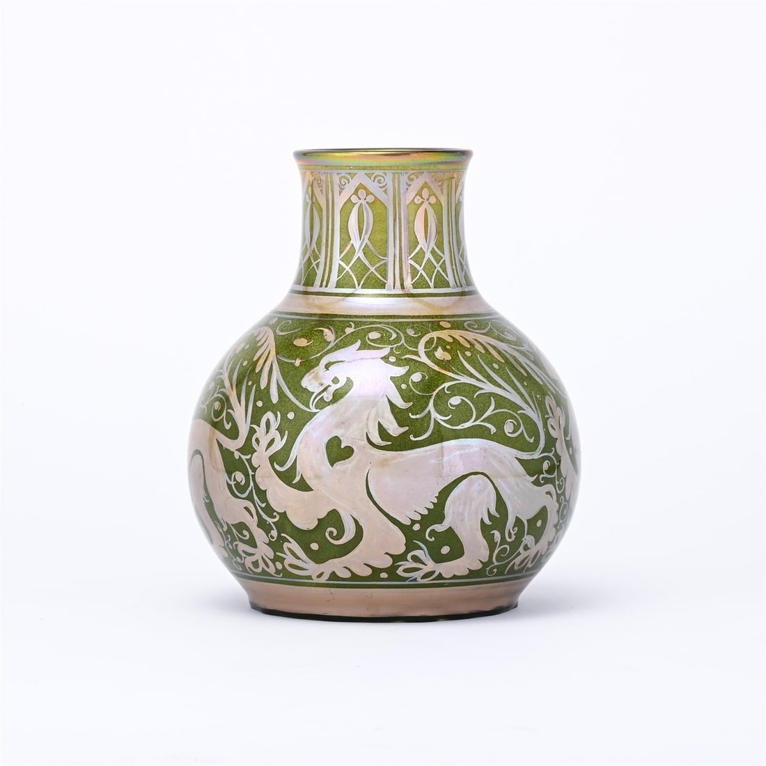 A PILKINGTON'S, LANCASTRIAN LUSTRE GLOBULAR VASE DECORATED BY GORDON FORSYTH CIRCA 1900: A PILKINGTON'S LANCASTRIAN LUSTRE GLOBULAR VASE DECORATED BY GORDON FORSYTH CIRCA 1900Decorated with heraldic lionsImpressed marksModel 286418.5cm high