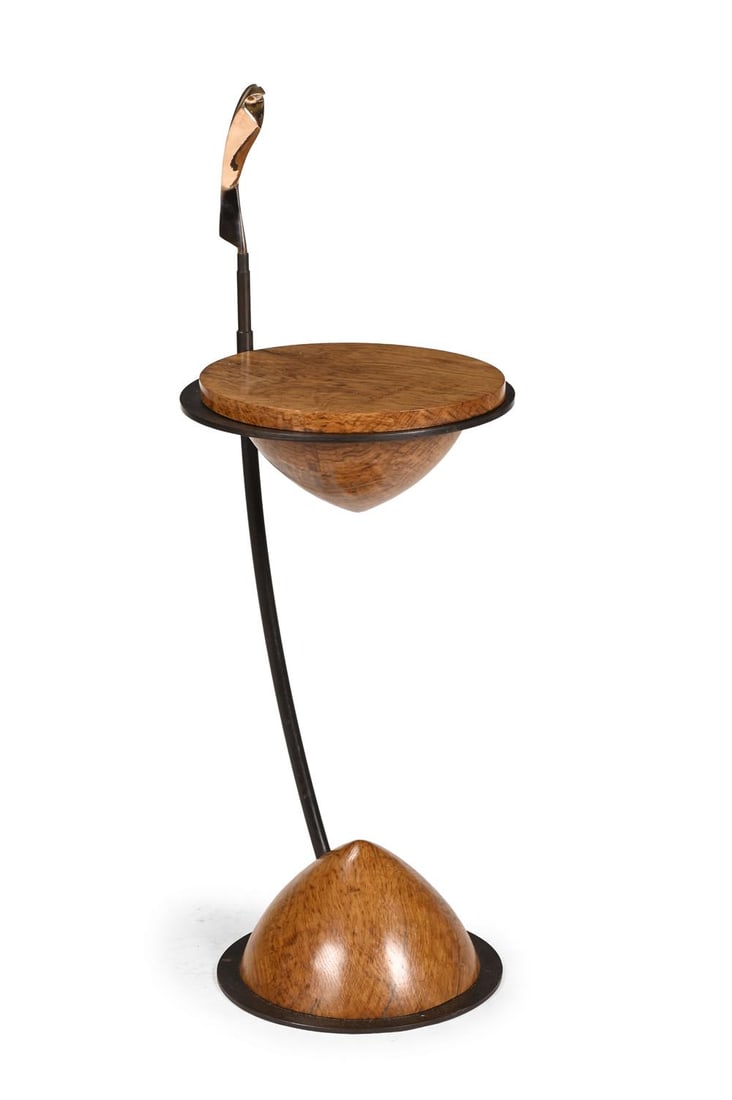 PHILIP HEARSEY (BRITISH, B.1946), 'SURVEYOR II' TABLE; 2009: PHILIP HEARSEY (BRITISH, B.1946)'SURVEYOR II' TABLE; 2009Tiger oak, steel, bronze bird finialArtist's monogram incised to underside of base104cm high, 37cm diameter