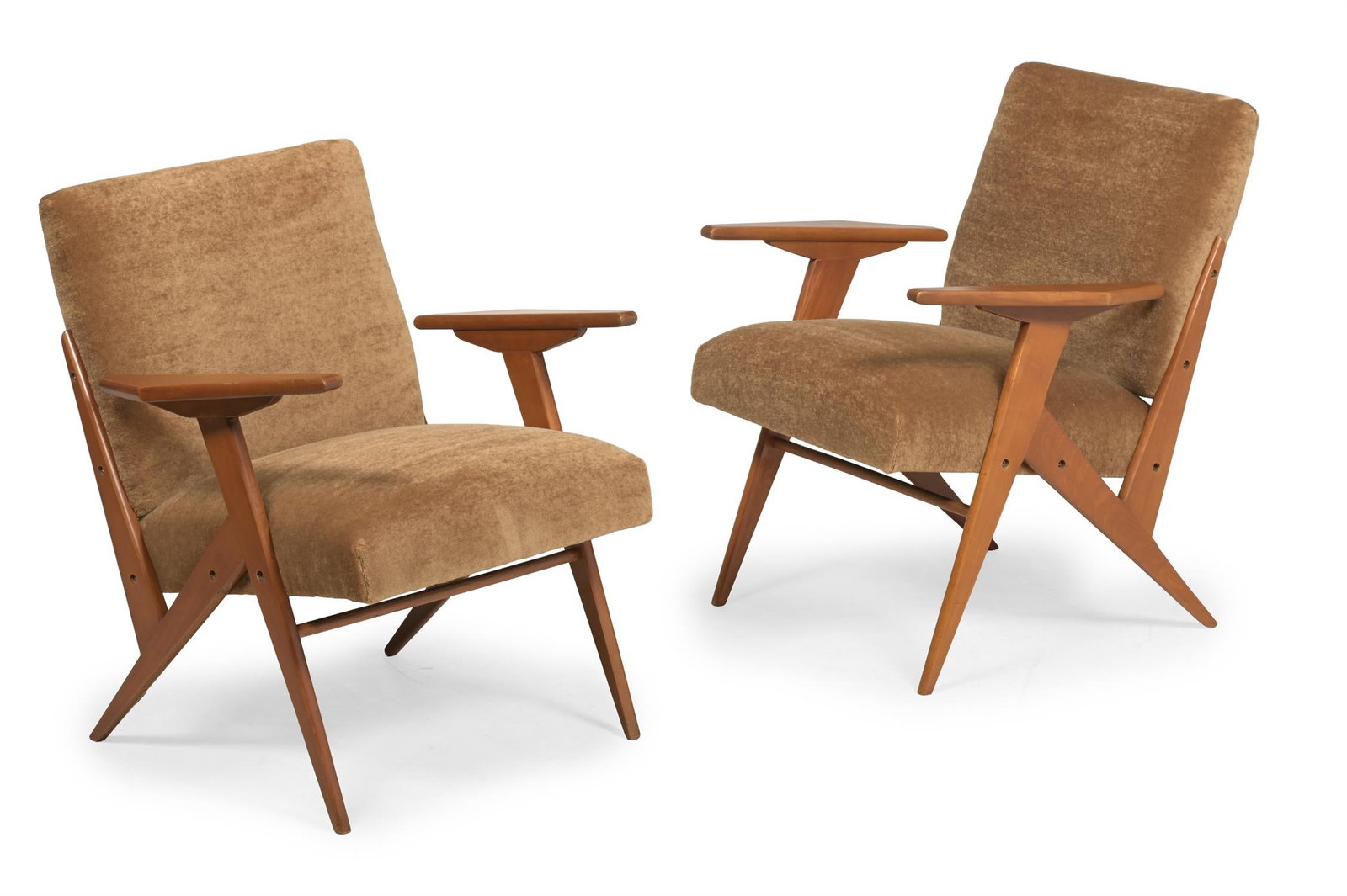 JOSÉ ZANINE CALDAS (BRAZILIAN, 1919-2001), PAIR OF ‘KID’ ARMCHAIRS; DESIGNED CIRCA: JOSÉ ZANINE CALDAS (BRAZILIAN, 1919-2001)PAIR OF 'KID' ARMCHAIRS; DESIGNED CIRCA 1950Pau Marfim wood, brown velour upholstery; Z-shape frame 76cm high, 67cm wide, 60cm deepLiterature:Nilufar (ed.