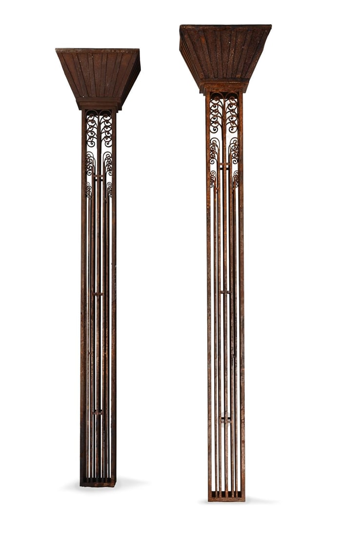 IN THE STYLE OF EDGAR BRANDT (FRENCH), A PAIR OF ART DECO ARCHITECTURAL PILLARS; CIRCA 1930: IN THE STYLE OF EDGAR BRANDT (FRENCH, 1880-1960)A PAIR OF ART DECO ARCHITECTURAL PILLARS; CIRCA 1930Cast and worked iron252cm high, 48.5cm wide at topProvenance:Sotheby's London, 'Fine 20th Century De