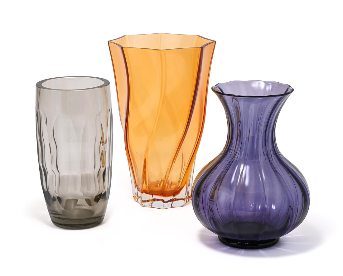 ELIS BERGH (1881-1954), FOR KOSTA BODA (SWEDISH), VASE, 1937: ELIS BERGH (1881-1954) FOR KOSTA BODA (SWEDISH)VASE, 1937Smokey grey glassInscribed Kosta 1937 with indistinct model number.25cm highTogether with two other art glass vases, of flared form, unsigned,