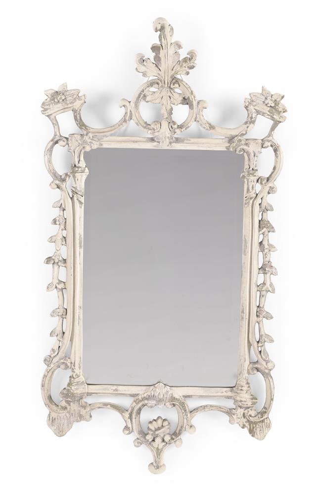 A WHITE PAINTED COMPOSITION WALL MIRROR, BY SOPHIE CONRAN, MODERN: A WHITE PAINTED COMPOSITION WALL MIRROR BY SOPHIE CONRAN, MODERN With a distressed lime wash finish and bevelled mirror plate 118cm high, 59cm wide Condition Report: PLEASE NOTE: ALL LOTS ARE LOCATED