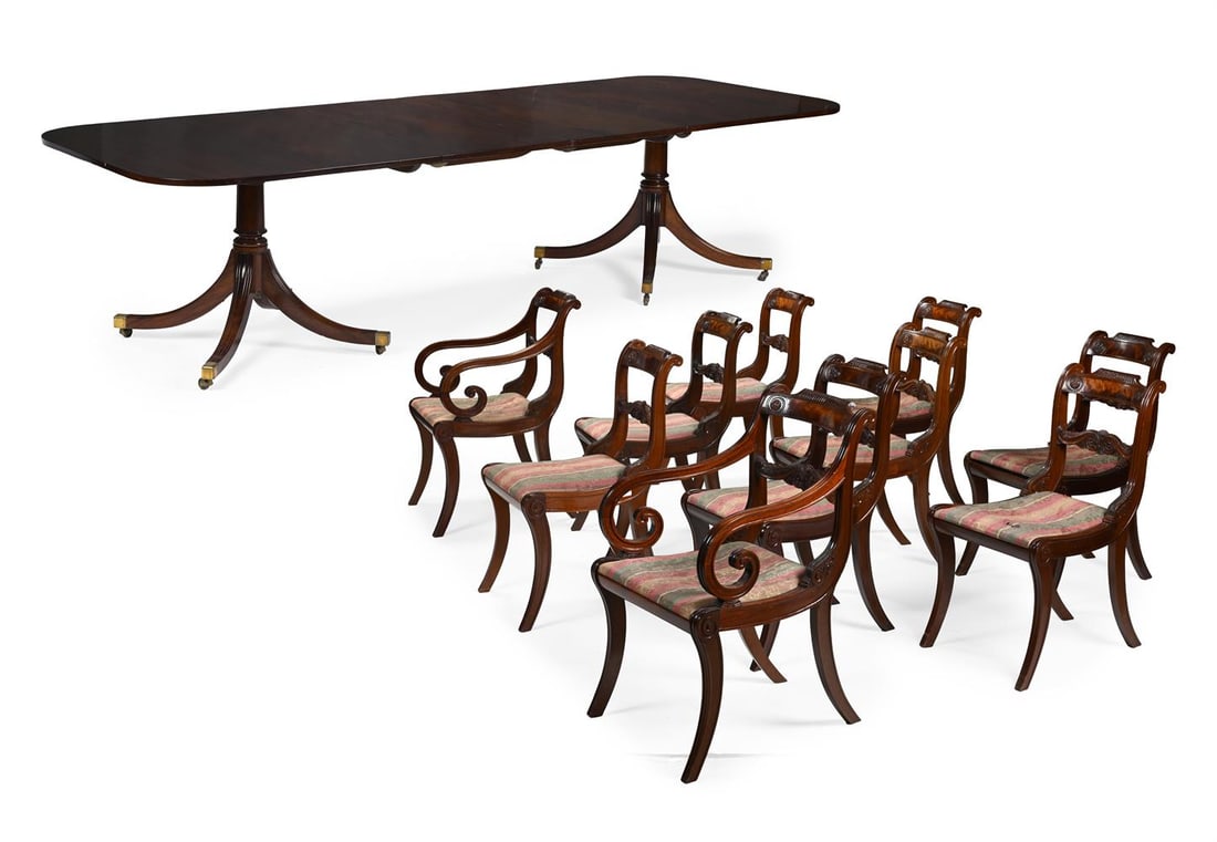 A WILLIAM TILLMAN MAHOGANY TWIN PEDESTAL DINING TABLE AND SET OF TEN CHAIRS, MANNER OF GILLOWS: A WILLIAM TILLMAN MAHOGANY TWIN PEDESTAL DINING TABLE AND A SET OF TEN CHAIRS REGENCY STYLE, IN THE MANNER OF GILLOWS, THIRD QUARTER 20TH CENTURY The chairs including a pair of carver chairs, the
