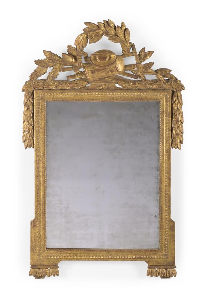 A LOUIS XVI CARVED WOOD AND GILT GESSO WALL MIRROR, FRENCH, CIRCA 1790: A LOUIS XVI CARVED WOOD AND GILT GESSO WALL MIRROR FRENCH, CIRCA 1790 With martial trophy surmount 122cm high, 72cm wide Condition Report: PLEASE NOTE: ALL LOTS ARE LOCATED AT SACKVILLE WEST STORAGE