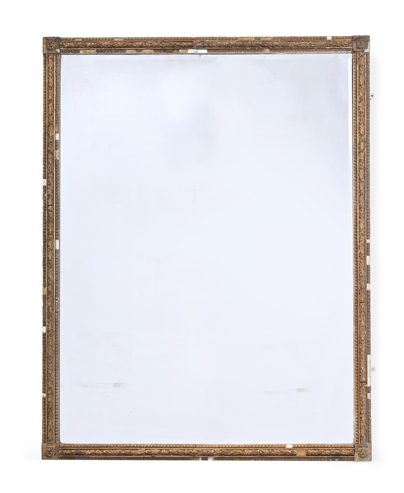 A LARGE GILT COMPOSITION MIRROR, IN REGENCY STYLE, 19TH CENTURY: A LARGE GILT COMPOSITION MIRROR IN REGENCY STYLE, 19TH CENTURY With a bevelled plate and lion mask corners 160cm high, 120cm wide Provenance: Lonsdale Family collection formerly from Kingstone Lisle
