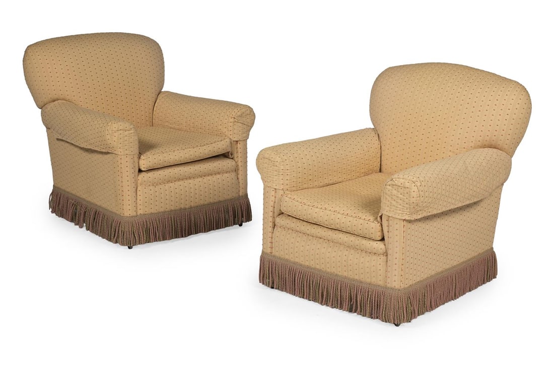 A PAIR OF DEEP SEATED TRADITIONAL UPHOLSTERED ARMCHAIRS, CIRCA 1910 (1 of 3)