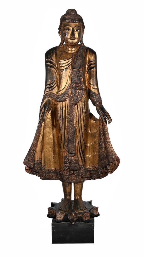 A LARGE BURMESE GILTWOOD STANDING FIGURE OF BUDDHA, LATE 19TH OR EARLY 20TH CENTURY: A LARGE BURMESE GILTWOOD STANDING FIGURE OF BUDDHA