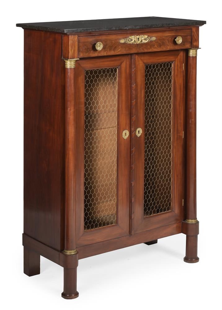 A LOUIS PHILIPPE MAHOGANY, GILT METAL MOUNTED AND MARBLE TOPPED CABINET, CIRCA 1840: A LOUIS PHILIPPE MAHOGANY, GILT METAL MOUNTED AND MARBLE TOPPED CABINET CIRCA 1840 Fitted with a frieze drawer, each door with gilt wire infill panels opening to adjustable shelves Condition Report: