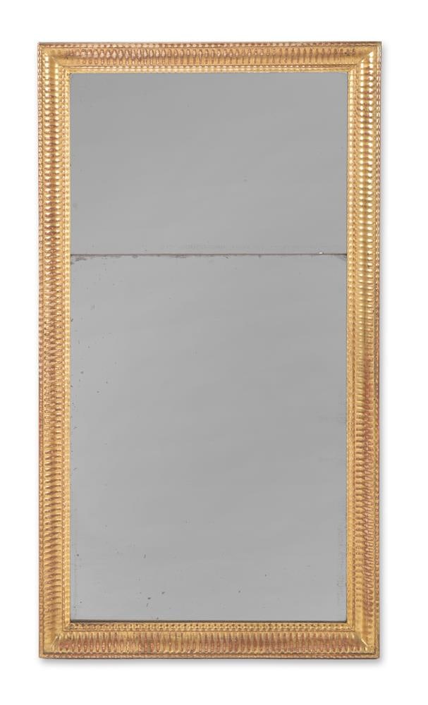 A GILT FRAMED RIPPLE MOULDED WALL MIRROR, PROBABLY DUTCH, SECOND HALF 19TH CENTURY: A GILT FRAMED RIPPLE MOULDED WALL MIRROR PROBABLY DUTCH, SECOND HALF 19TH CENTURY 134cm high, 74cm wide Condition Report: PLEASE NOTE: ALL LOTS ARE LOCATED AT SACKVILLE WEST STORAGE IN ANDOVER (SP10