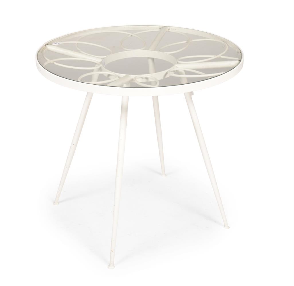A CASA & GIARDINO PAINTED METAL AND GLASS GARDEN TABLE, CIRCA 1950s: A CASA & GIARDINO PAINTED METAL AND GLASS GARDEN TABLE CIRCA 1950s 76cm high, 82cm diameter Condition Report: PLEASE NOTE: ALL LOTS ARE LOCATED AT SACKVILLE WEST STORAGE IN ANDOVER (SP10 3SA) AND