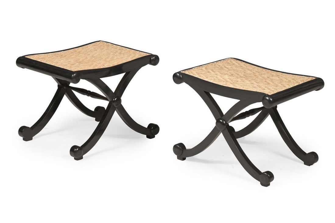 Y A PAIR OF EBONY 'X' FRAMED STOOLS, IN REGENCY STYLE, LATE 20TH OR EARLY 21ST CENTURY: Y A PAIR OF EBONY 'X' FRAMED STOOLS IN REGENCY STYLE, PROBABLY INDIAN, LATE 20TH OR EARLY 21ST CENTURY Each with woven split cane mat panel scenes each 43cm high, 56cm wide, 42cm deep