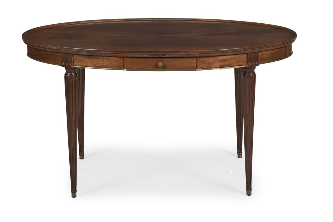 A FRENCH EMPIRE MAHOGANY DISH TOPPED OVAL TABLE, CIRCA 1814 - 2